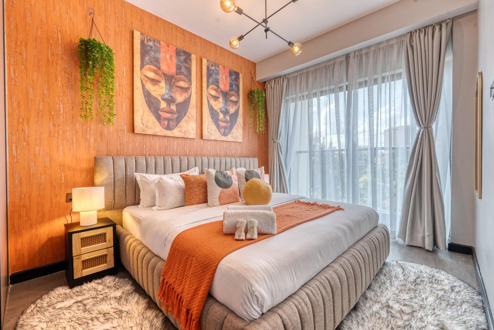 Escada 206 orange bedroom styled by Elite Stays Africa